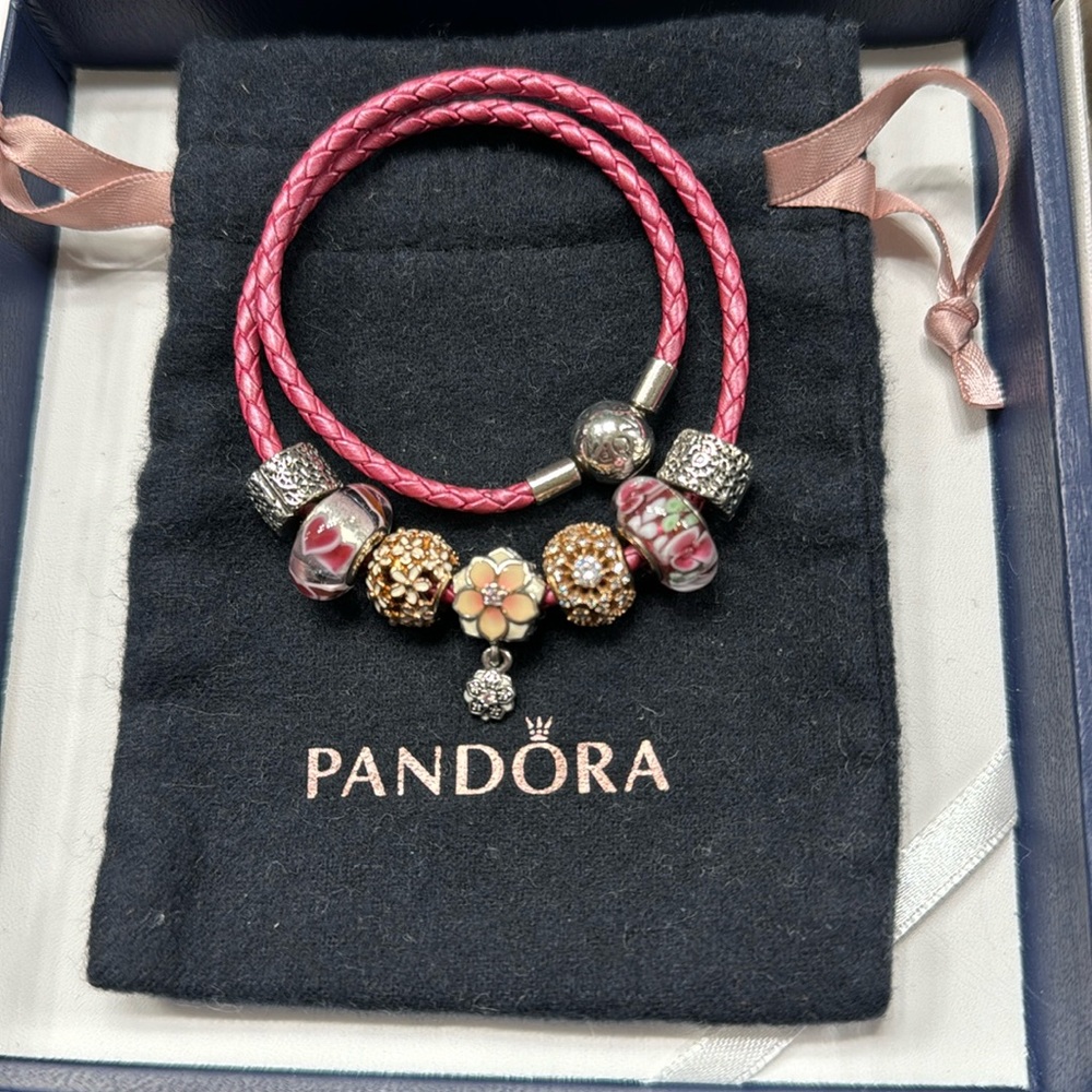 Pandora pink leather bracelet with 5 charms and 2 clips